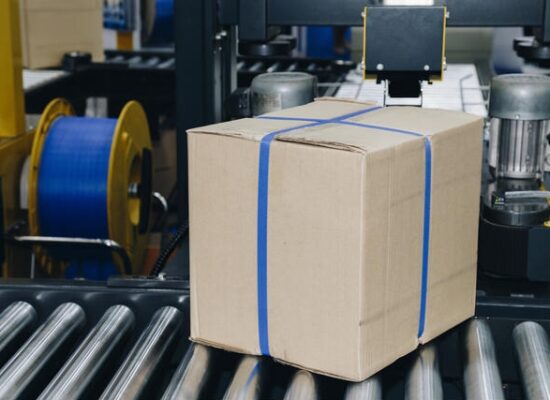 Arbemu, cardboard packaging - cardboard-box-of-product-packaging-is-moving-on-conveyor-belt-of-automatic-packing-machine-in-the-manufacturing-factory- supplier, manufacturer, in Turkey, Turkei, Turquie