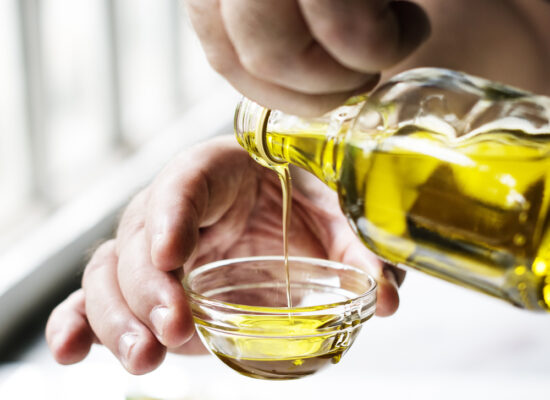 Arbemu - Edible oil, closeup-hands-pouring-virgin-olive-oil , supplier, manufacturer, wholesaler in Turkey